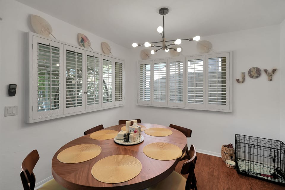 Expandable dining table sits 6-8.