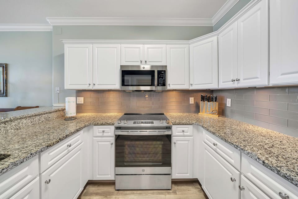 The kitchen is fully stocked with the essentials you'll need to prepare a meal.