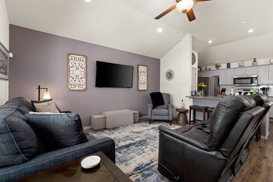 Spacious living room has three La-Z-Boy recliners and a queen size sleeper sofa with a memory foam mattress.