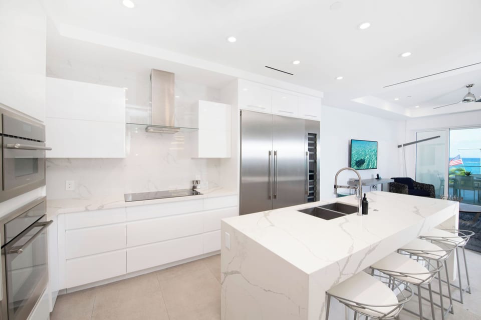 Gourmet kitchen with island seating for four.
