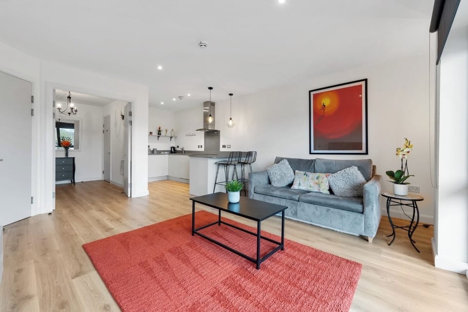 Large open plan lounge with 65in tv and doors to our beautiful balcony.