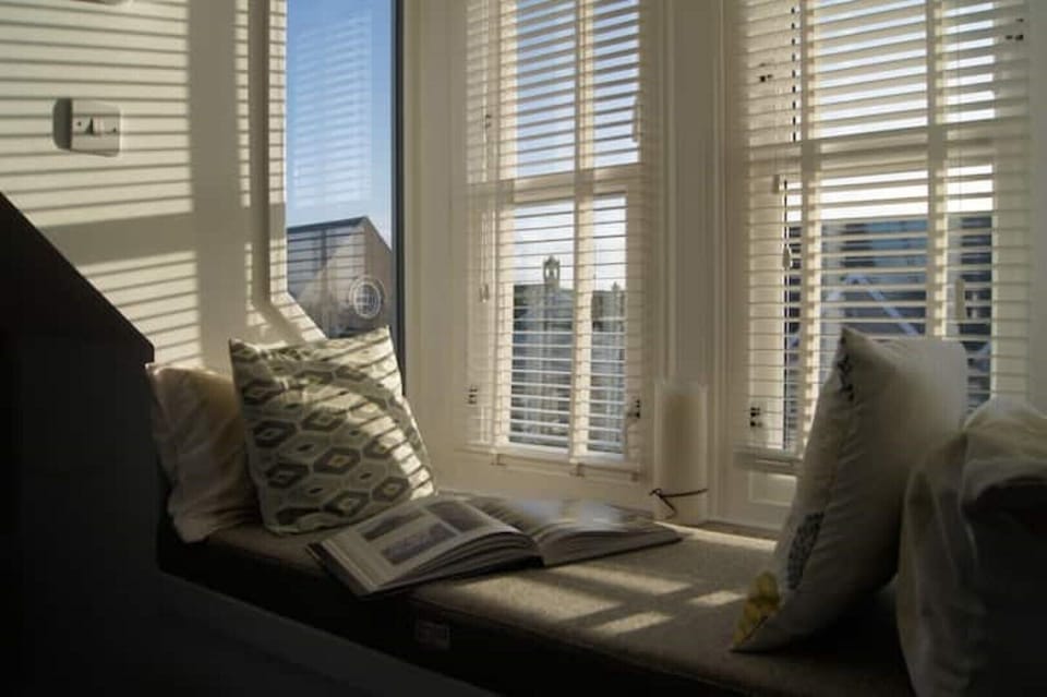 Enjoy a read in the window seat 