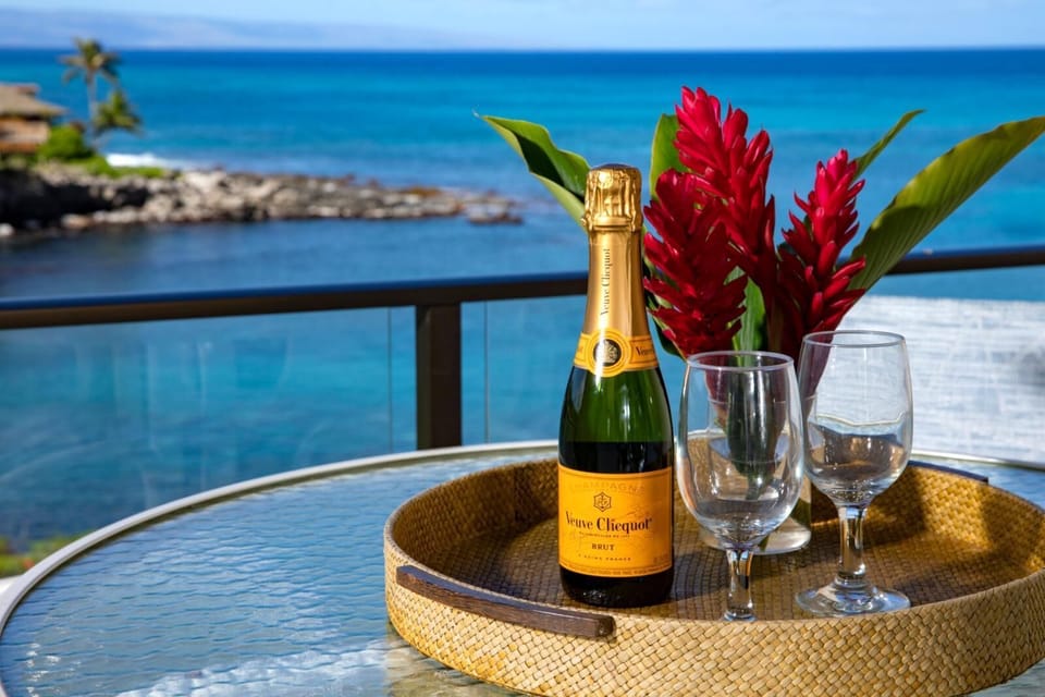 Toast to paradise from your private lanai, where sparkling ocean views and tropical blooms create a picture-perfect dining escape    