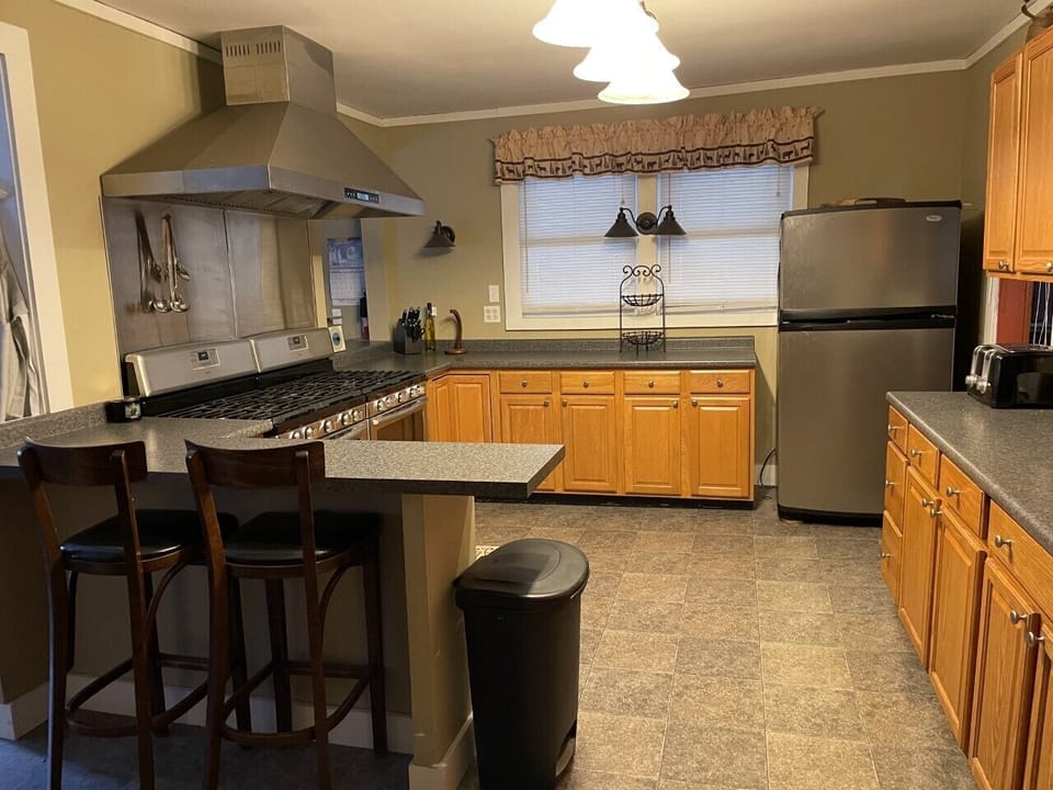 Spacious kitchen w/2 sinks 2 stoves coffee maker toaster microwave & dishwasher!