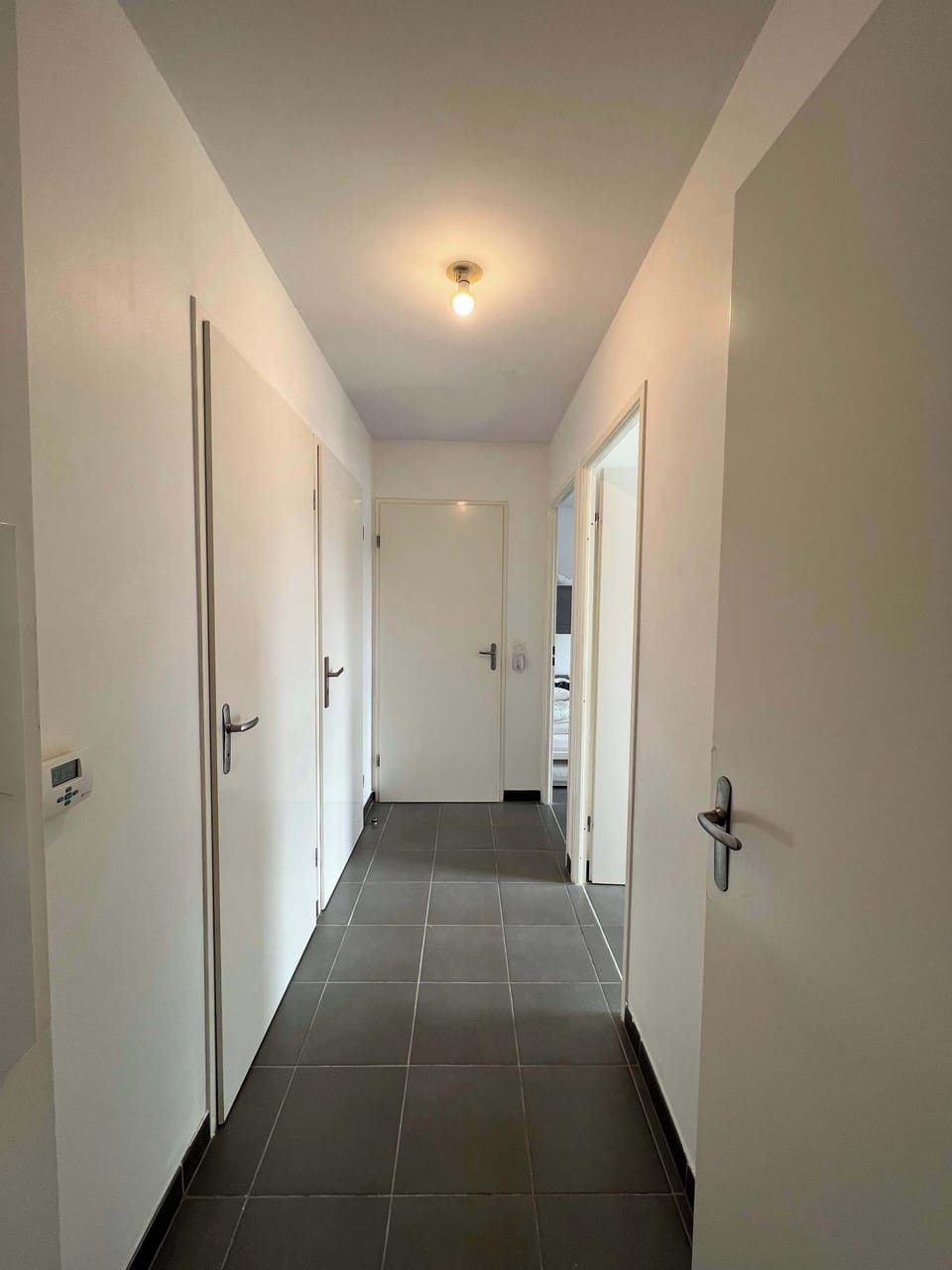 Couloir desservant les chambres et la salle de bain