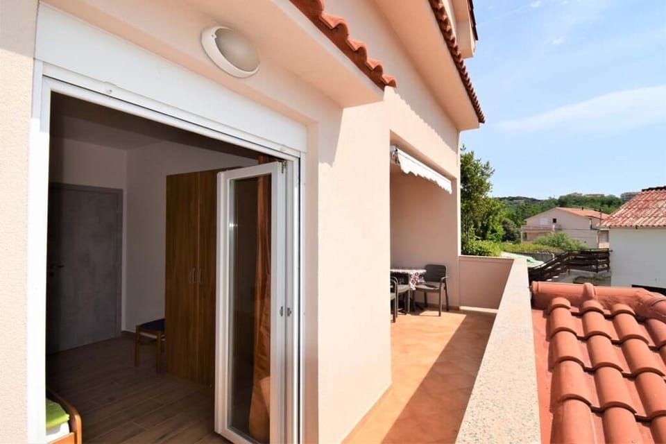 Private terrace with outdoor seating.