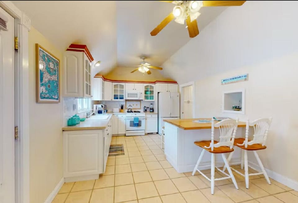 Fully stocked w/utensils, plates, baking pans, olive oil and spices for cooking.