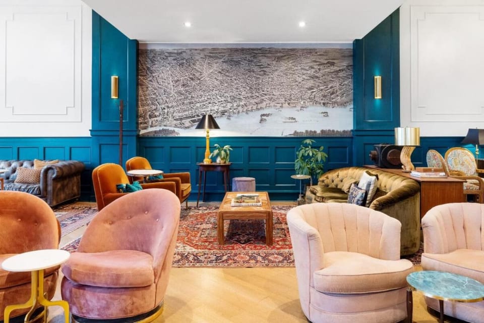 Gather with friends amid eclectic textures and warm lighting.