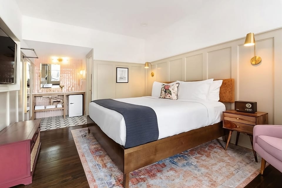 Unwind in a bright, spacious room with boutique-hotel comfort.