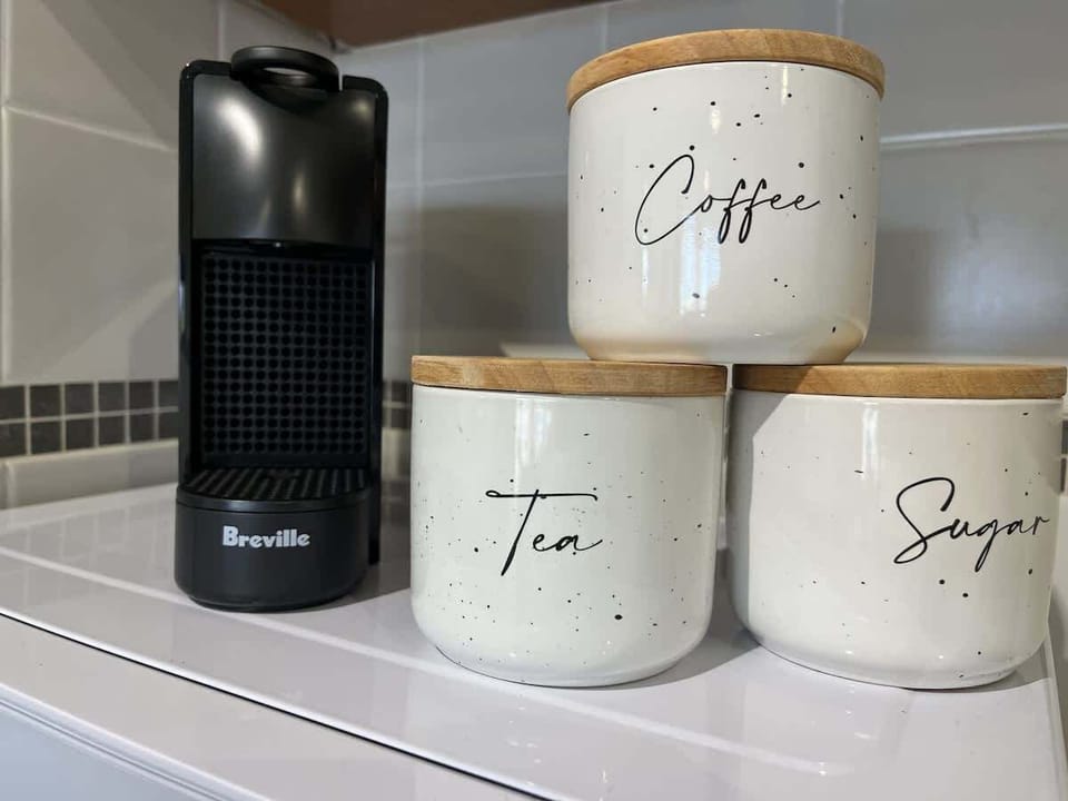 Start your day right with a fresh brew! Our kitchen features a convenient coffee machine, along with complimentary coffee, tea, and sugar for your enjoyment.