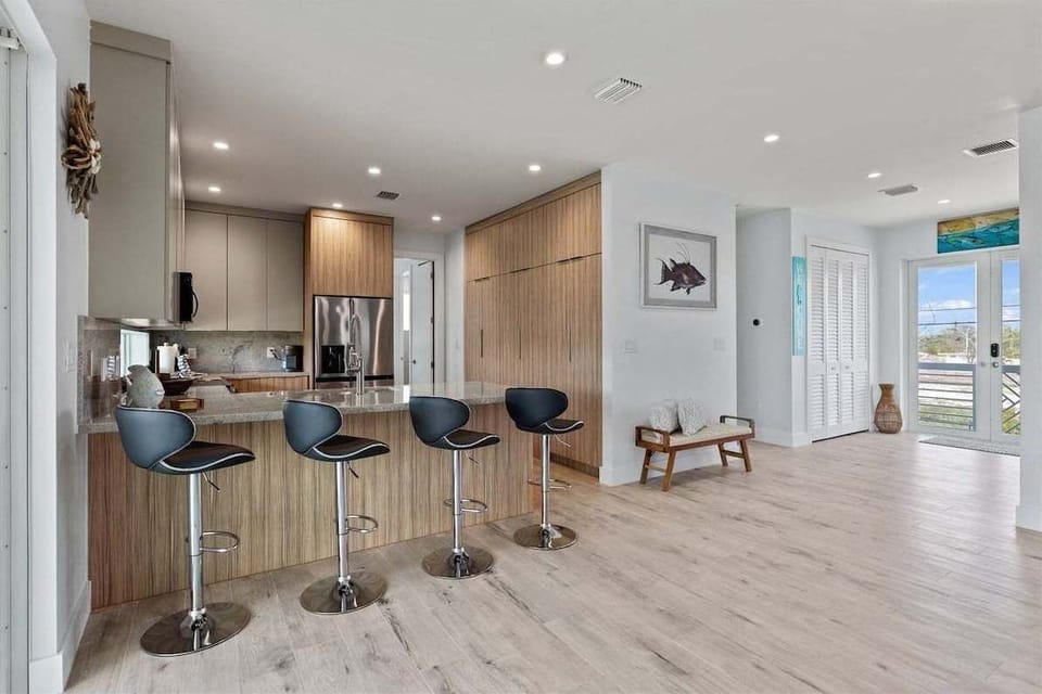 Spacious kitchen ideal for entertaining, seamlessly connected to the great room and outdoor living areas.