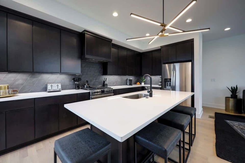 Gather around our large kitchen island, the perfect spot for meals, conversations, and making memories together.