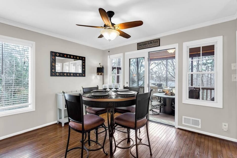 Dining room just off kitchen and screened in porch.