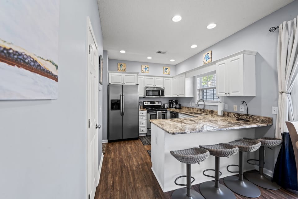 The kitchen counter provides additional space for serving snacks or meals