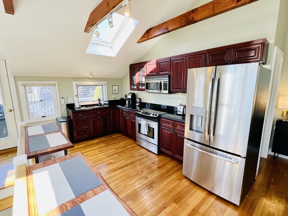 Kitchen and access to exclusive deck