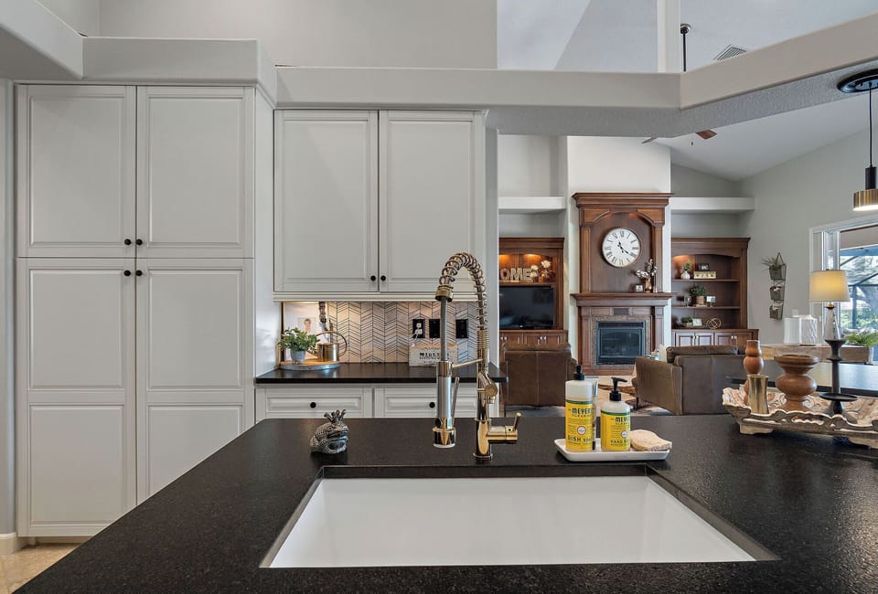 Tons of cabinets and handy farmhouse sink