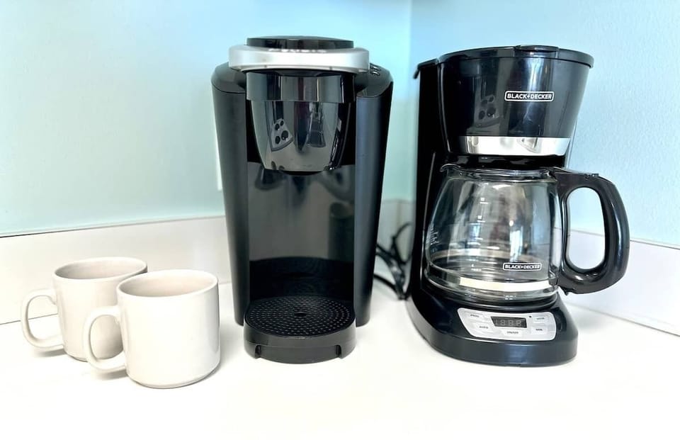 Coffee drinkers can enjoy either a regular drip coffee maker or a Keurig machine.