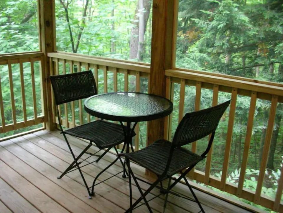 The porch is a wonderful place to have a meal.