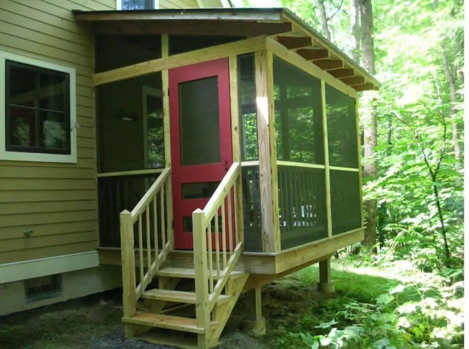 Exterior of porch, which faces the forest.