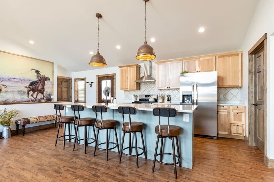 Large island and open concept for the whole family to gather.