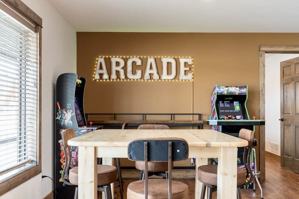 Small seating area to play a board game or cards while others play some arcade games!