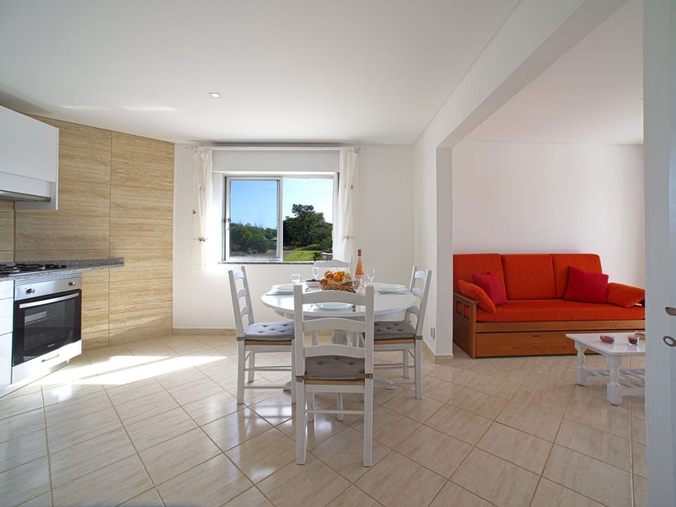 Furniture, Couch, Table, Building, Cabinetry, Window, Countertop, Architecture, Interior Design, Flooring