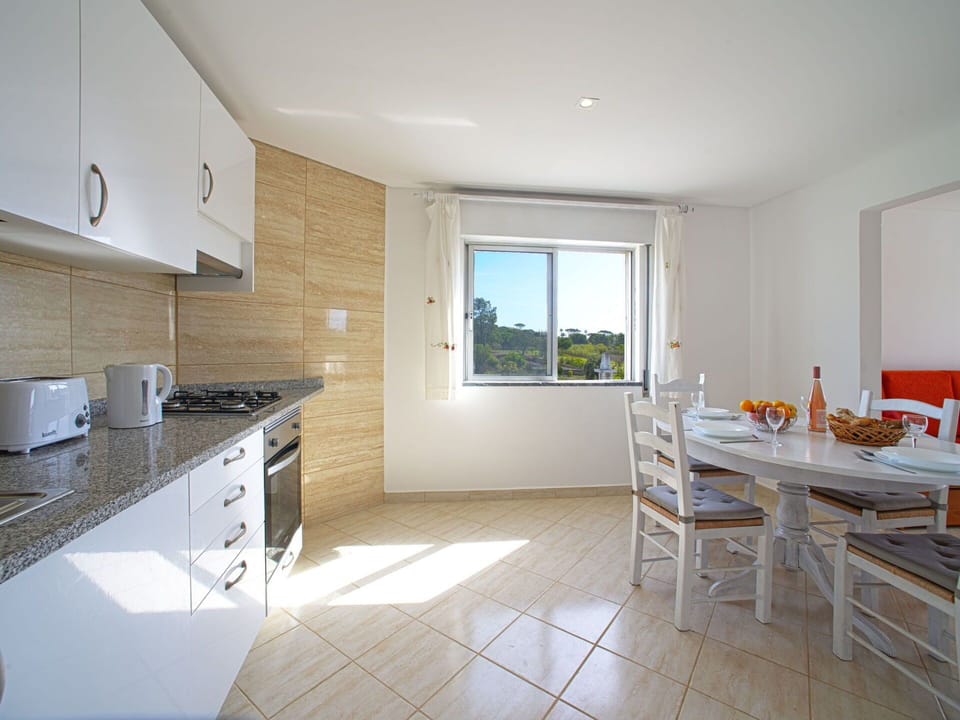 Cabinetry, Property, Furniture, Countertop, Kitchen, Kitchen Stove, Window, Building, Kitchen Appliance, Wood