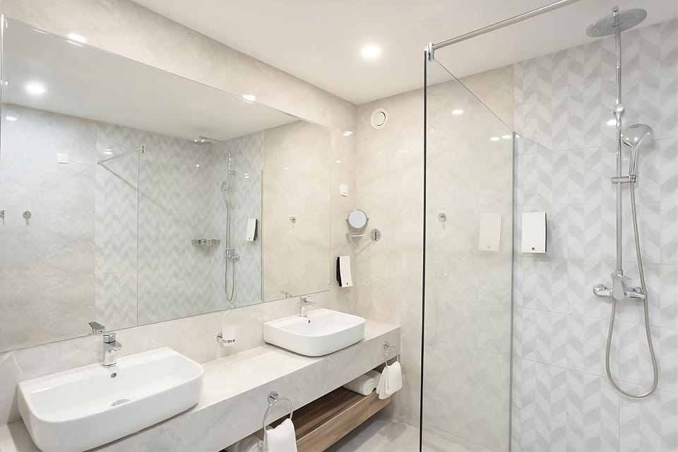 Full bathroom with a shower. Basic toiletries and towels are provided