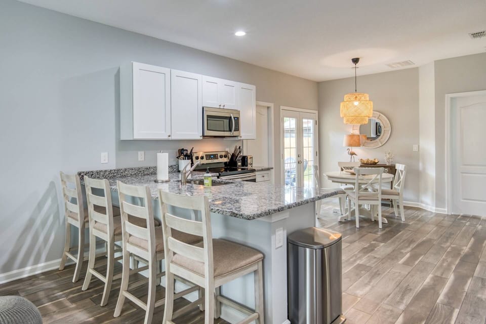 Central to the open floor plan is the fully equipped kitchen!