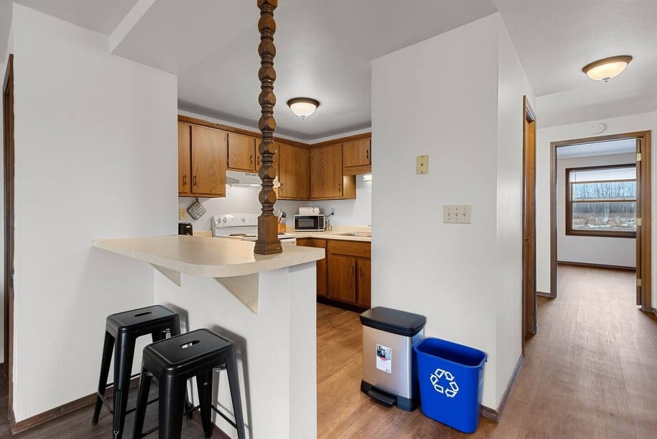 The kitchen well stocked with all the cookware, gadgets, and appliances you could need. 