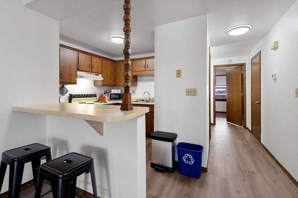 The kitchen features intimate pass-through seating for 2 or off-kitchen dining for 4 and is well stocked with all the cookware and gadgets you could need. 