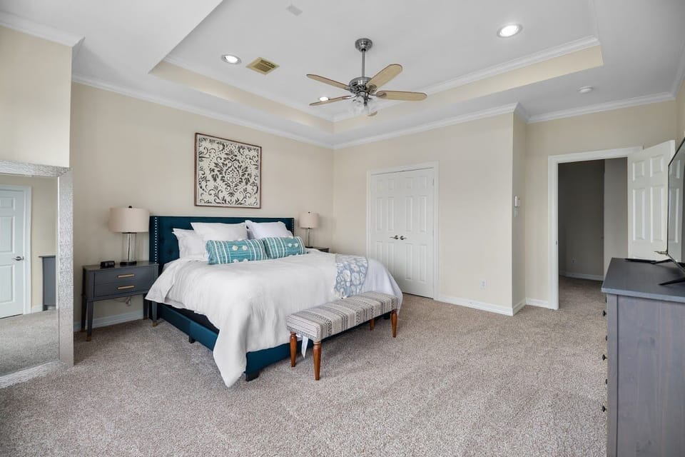 Another view of the master bedroom and king bed