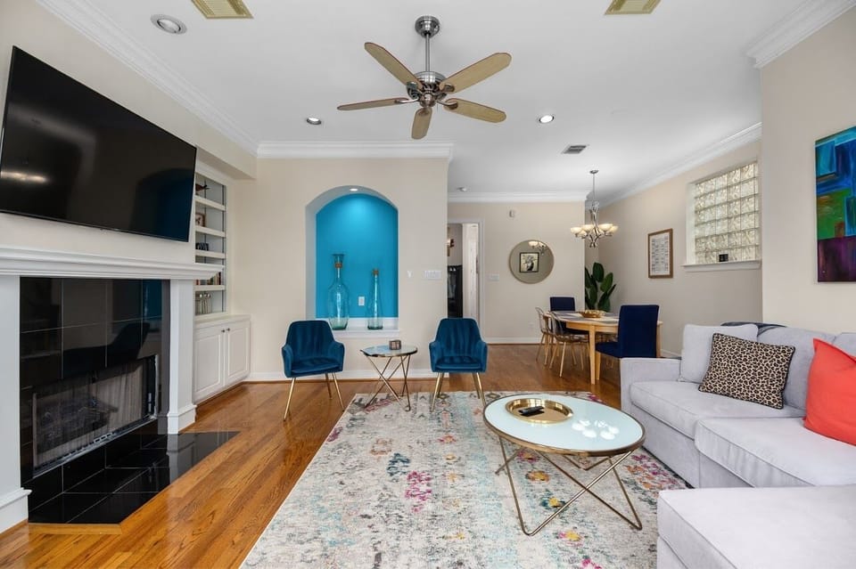 View from living room / fireplace toward dining area and kitchen hallway