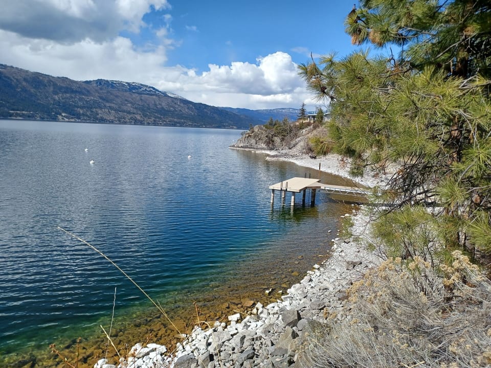 public swim dock and rocky shoreline