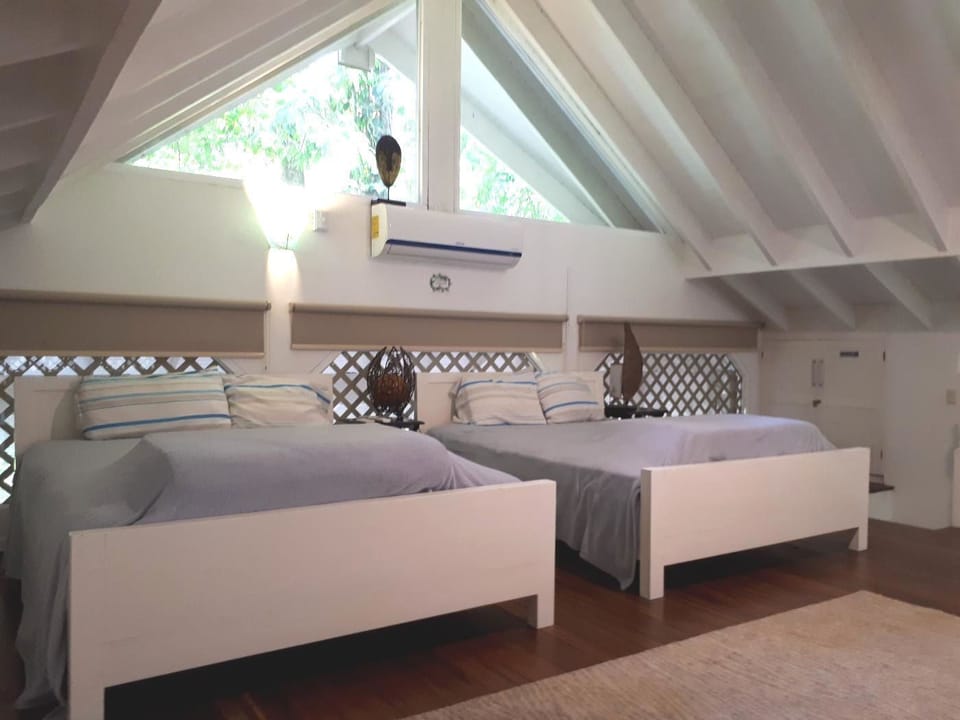 2 beds in the open area above 