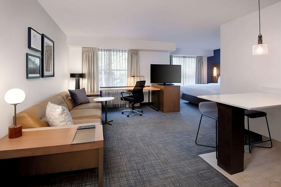 Spread out in a spacious suite with lounge and workspace.