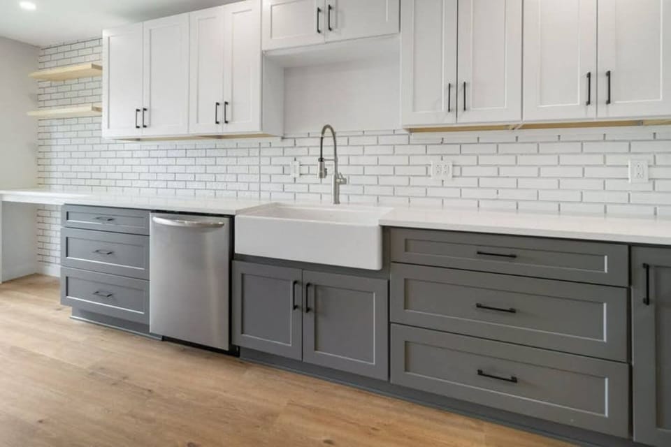 Unit #6468 (3 of 3) Spacious and stylish kitchen featuring modern cabinetry, a large farmhouse sink, and a convenient dishwasher. Ideal for preparing meals with ease. ️✨