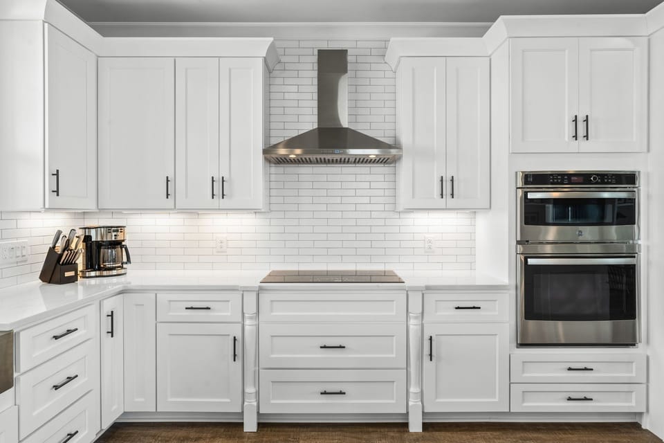 Induction stove with sleek stainless hood