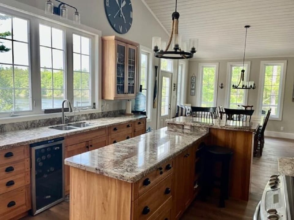 Kitchen overlooking the firepit and lake
