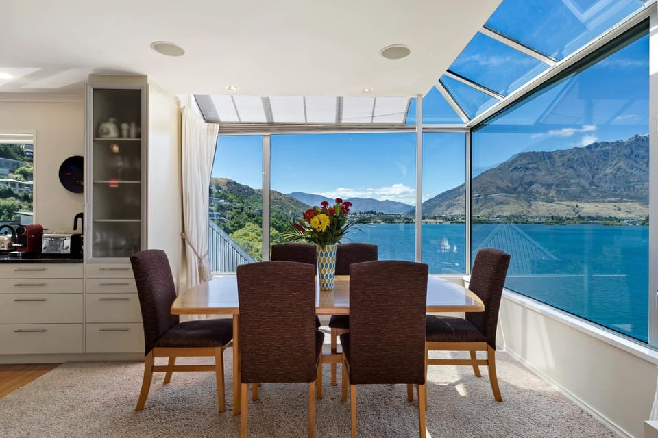 Dining Room: Enjoy breathtaking views while savoring meals in this elegant space!