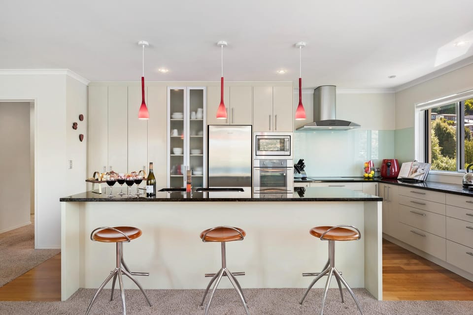Kitchen: Bright and stylish with modern finishes, perfect for culinary adventures with a view!