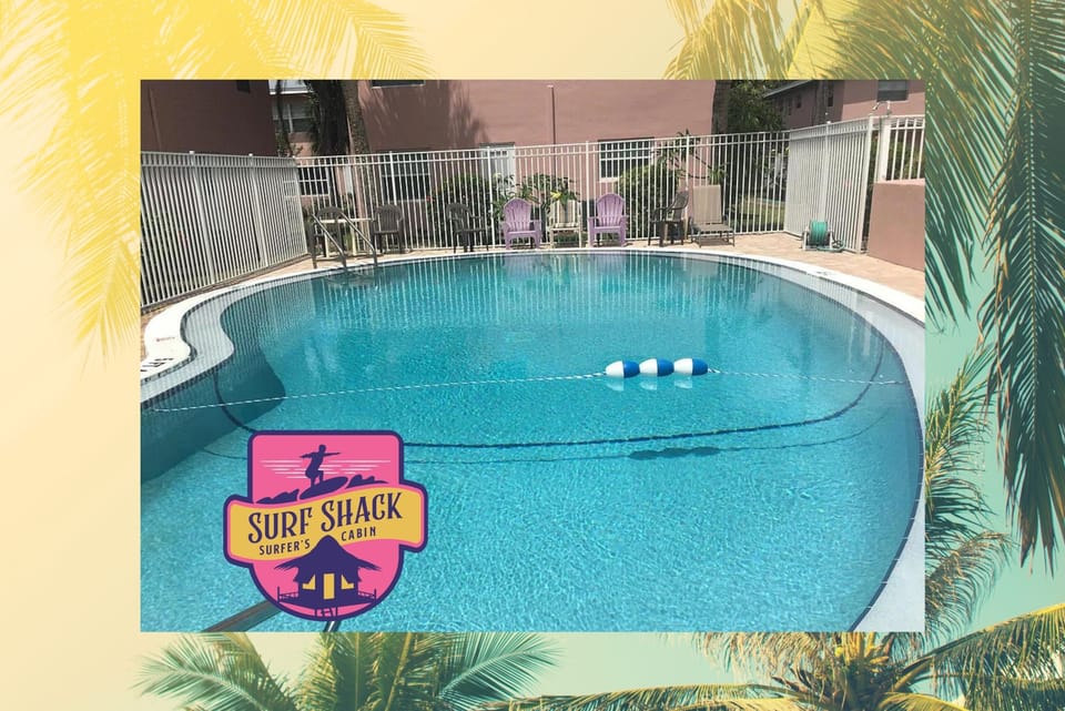 Condo complex features s nice sunny pool area