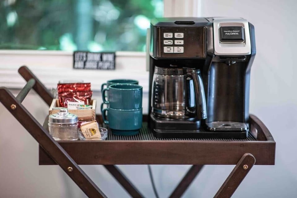 Awaken your senses at our well-appointed coffee bar, thoughtfully stocked with local coffee, a variety of K-cups, mugs, tea, and sugar