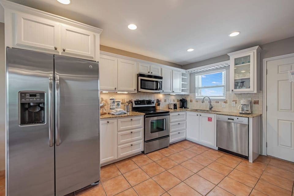 Cook memorable meals in your fully equipped kitchen with granite counters, stainless appliances, and everything you need for culinary adventures.