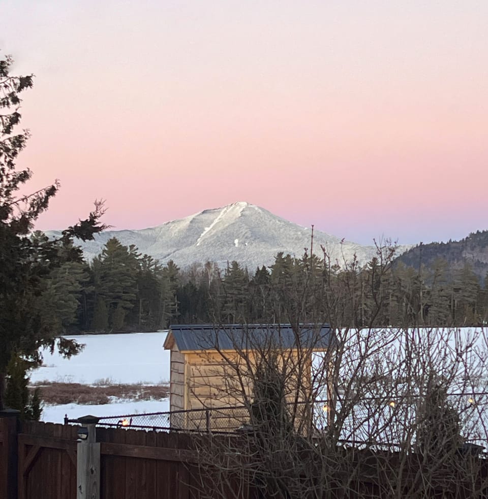 Amazing view of Whiteface Mountain nestled in the forest beyond Lake Placid