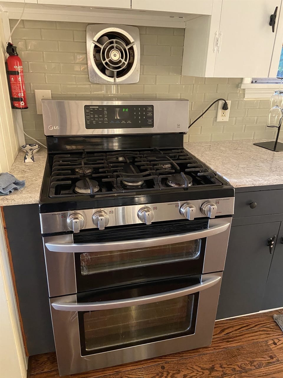 A double oven and a high end gas range is here for you. 