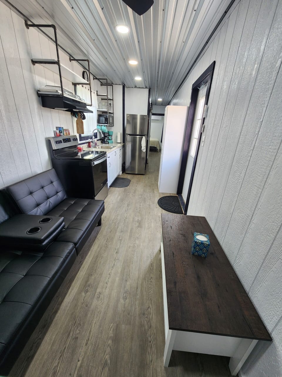 Futon bed for additional guests or taking a much needed nap.