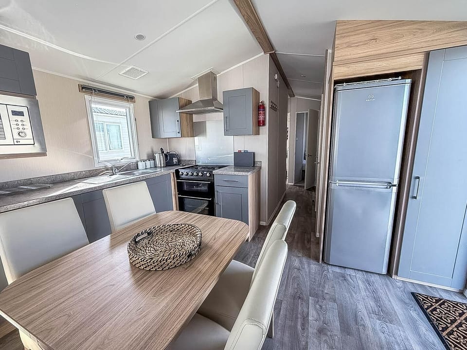 Enjoy the freedom of dog friendly caravan holidays at Broadland Sands Holiday Park Lowestoft, where the kitchen area in a caravan makes your family holiday UK both comfortable and convenient.