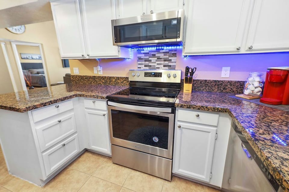 Kitchen with all silverware, pots and pans 