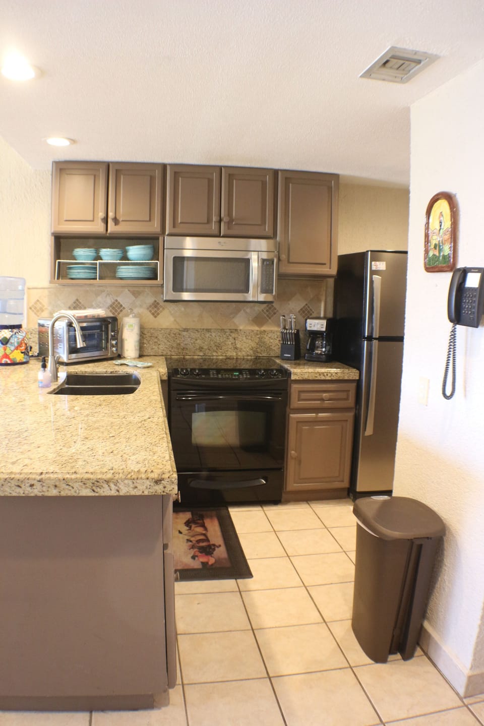 Kitchen is supplies with basic essentials.